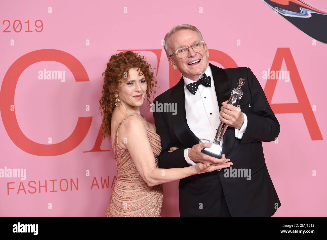 Bernadette Peters left, and honoree Bob Mackie pose in the winner's