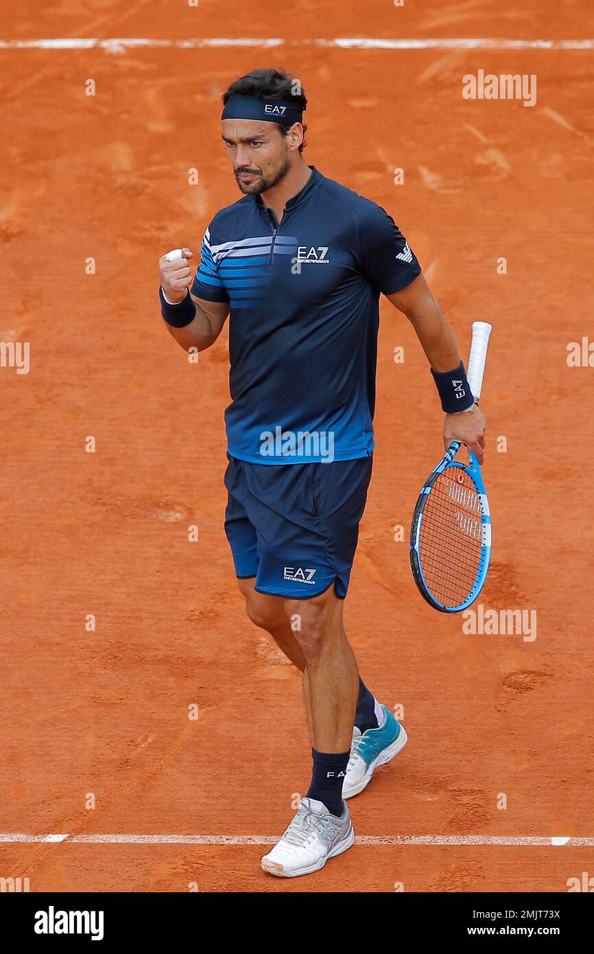 Italy's Fabio Fognini clenches his fist after scoring a point against  Germany's Alexander Zverev during their fourth round match of the French  Open tennis tournament at the Roland Garros stadium in Paris,