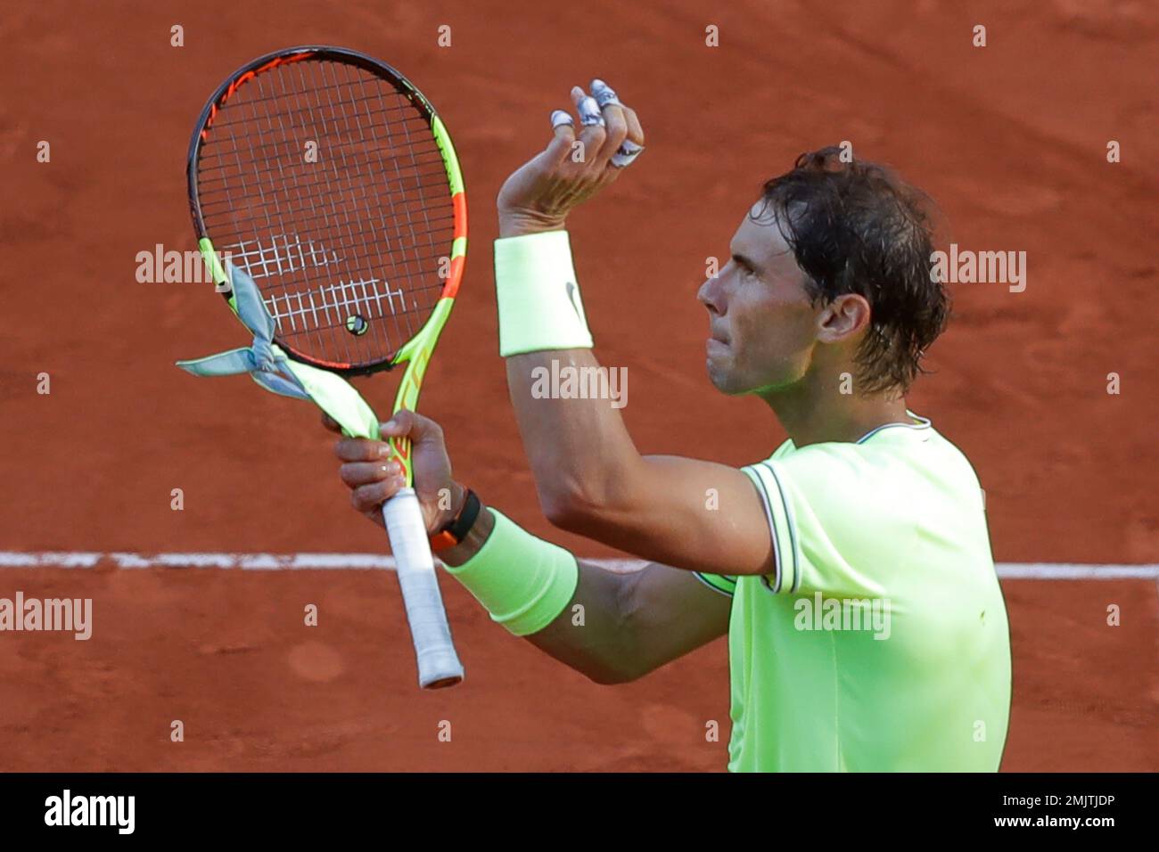 Spains Rafael Nadal celebrates winning his third round match of the French Open tennis tournament against Belgiums David Goffin in four sets, 6-1, 6-3, 4-6, 6-3, at the Roland Garros stadium in