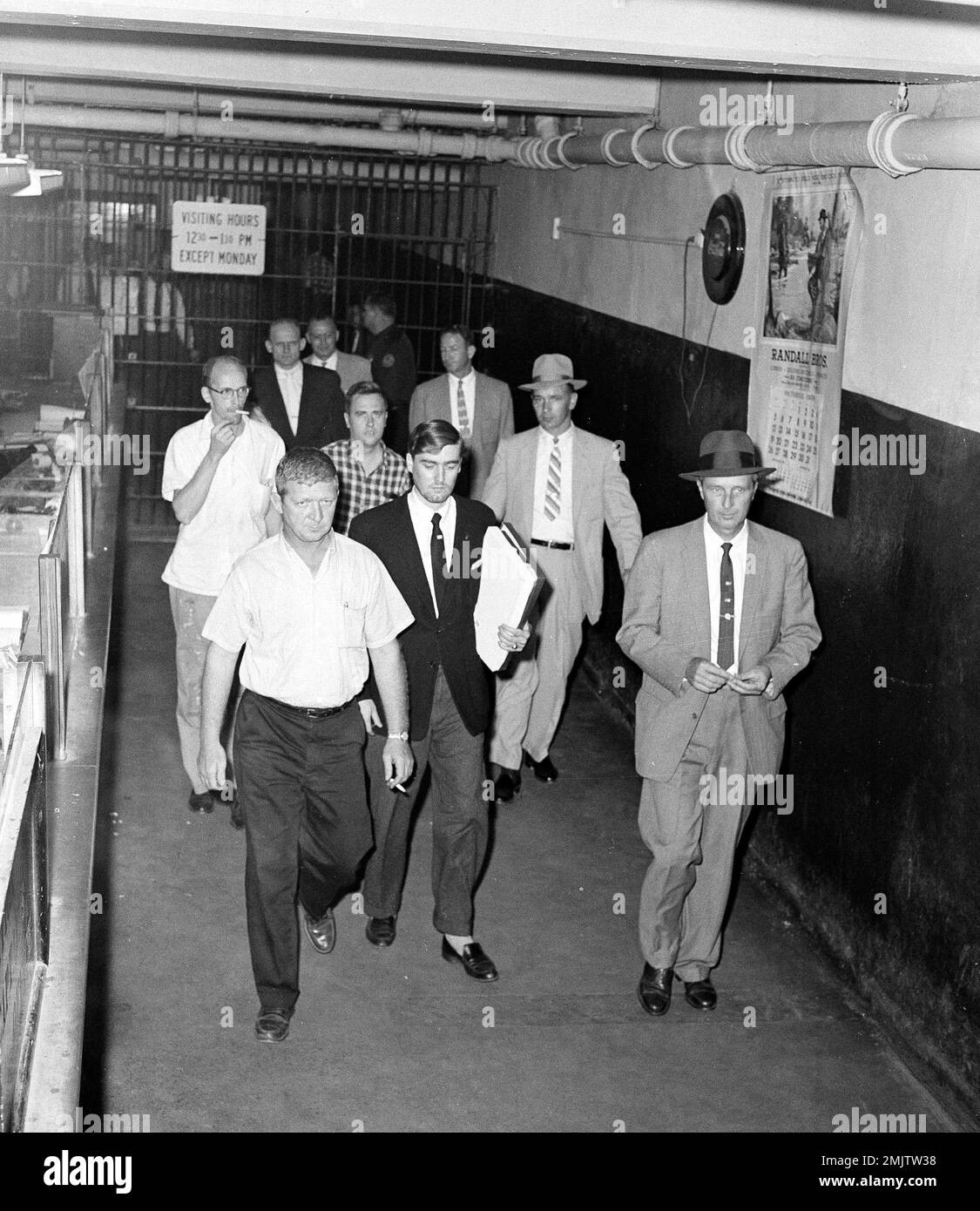 corley cigarette Five men held in the pre-dawn bombing of a Jewish temple in Atlanta on  Sunday, leave city jail, Oct. 17, 1958, en route to the Fulton County  courthouse for habeas corpus hearing