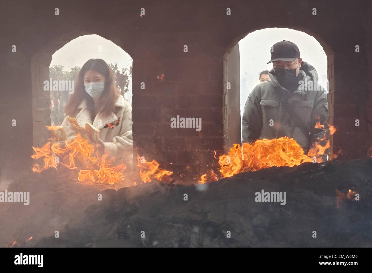 People burn incense sticks and pray for wealth at Guiyuan Buddhist ...