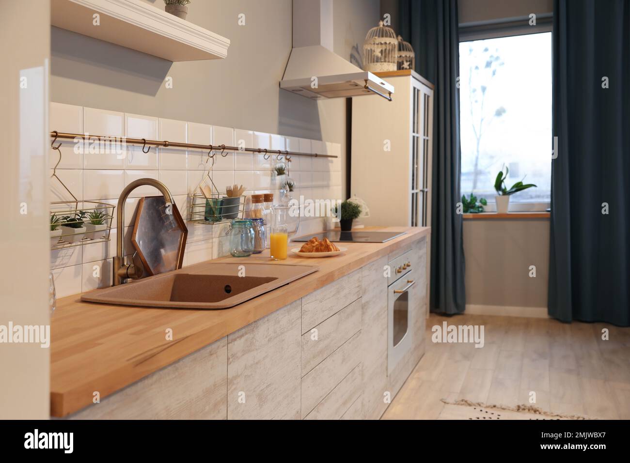 Modern kitchen interior with new stylish furniture Stock Photo - Alamy