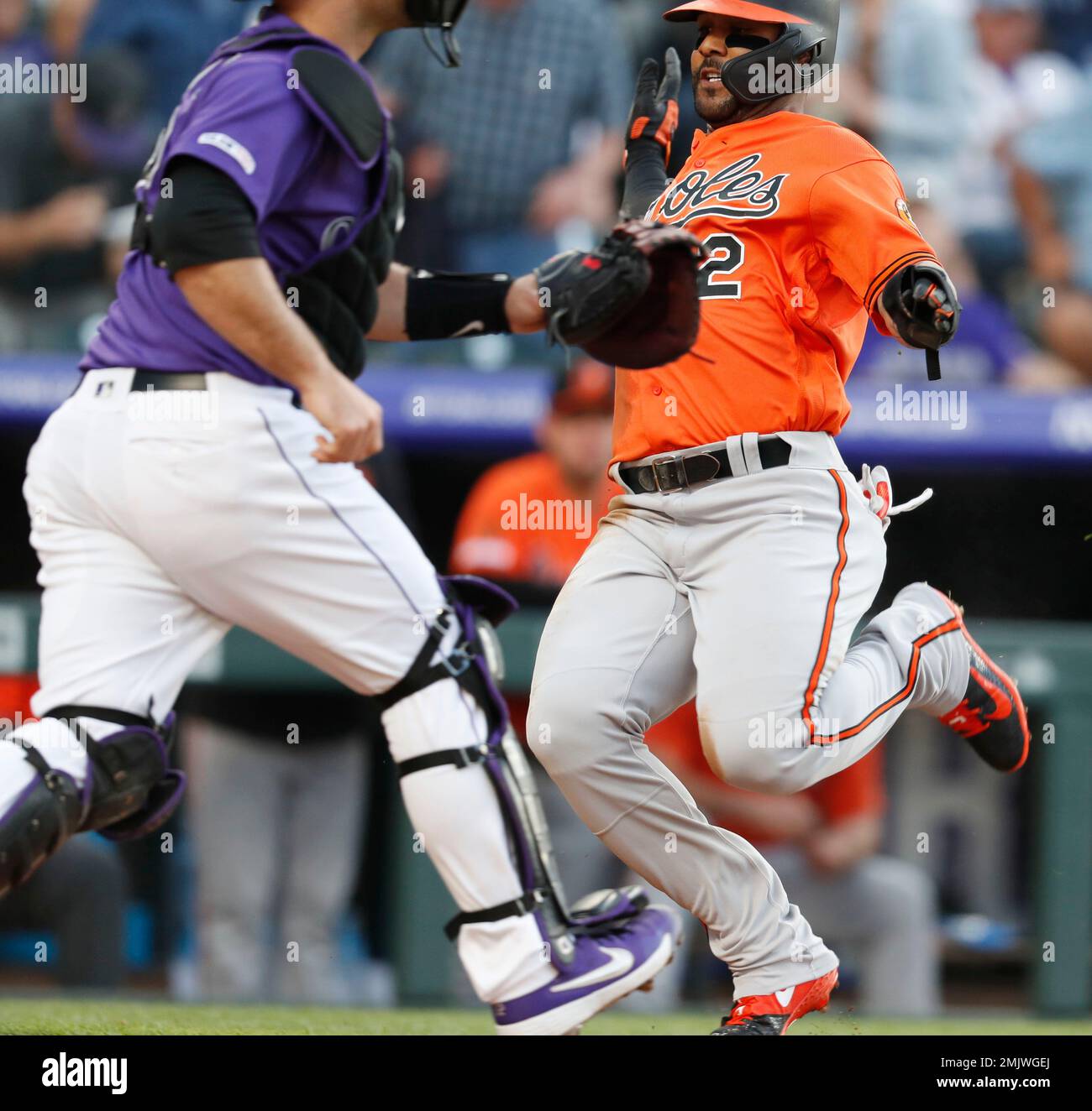 Baltimore Orioles' Renato Nunez, left, is greeted near home plate