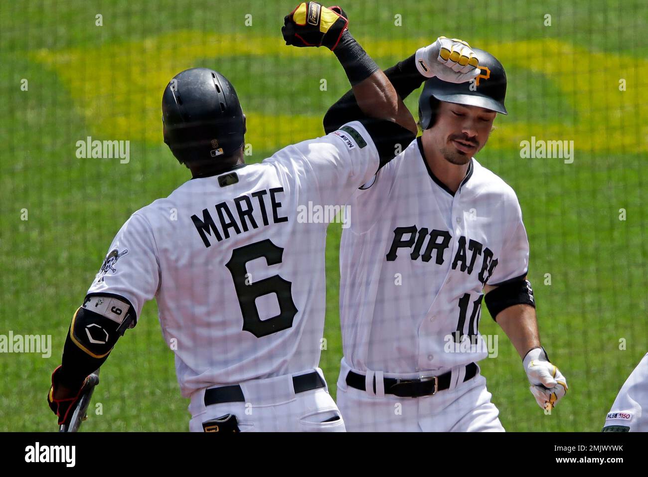 Miami Marlins' Starling Marte hits a single during the seventh inning of a  baseball game against