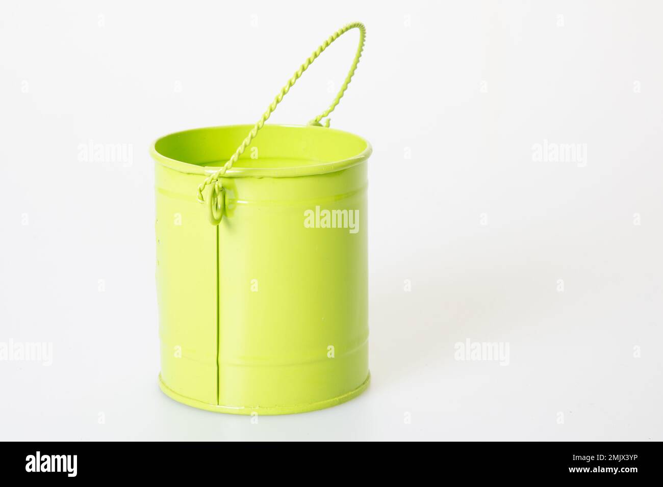green metal bucket pastel on white background Stock Photo Alamy
