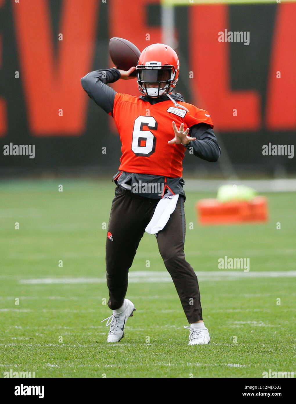 Cleveland Browns' Baker Mayfield throws a pass during an NFL football organized team activity