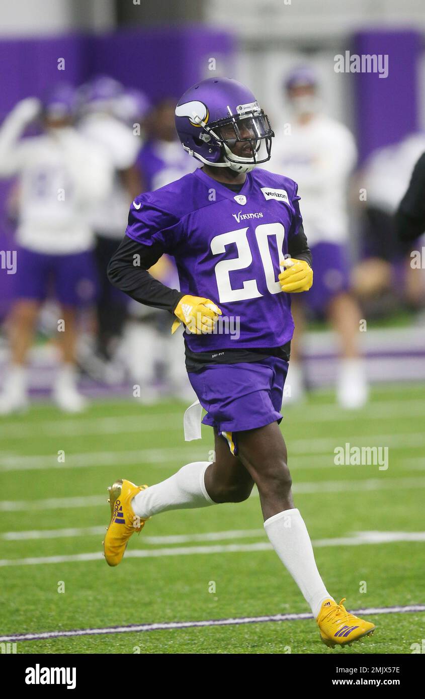 Minnesota Vikings cornerback Mackensie Alexander jogs during workouts