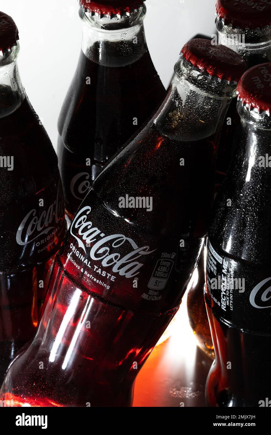 Cold Coke bottles with Ice cold refreshing Stock Photo Alamy