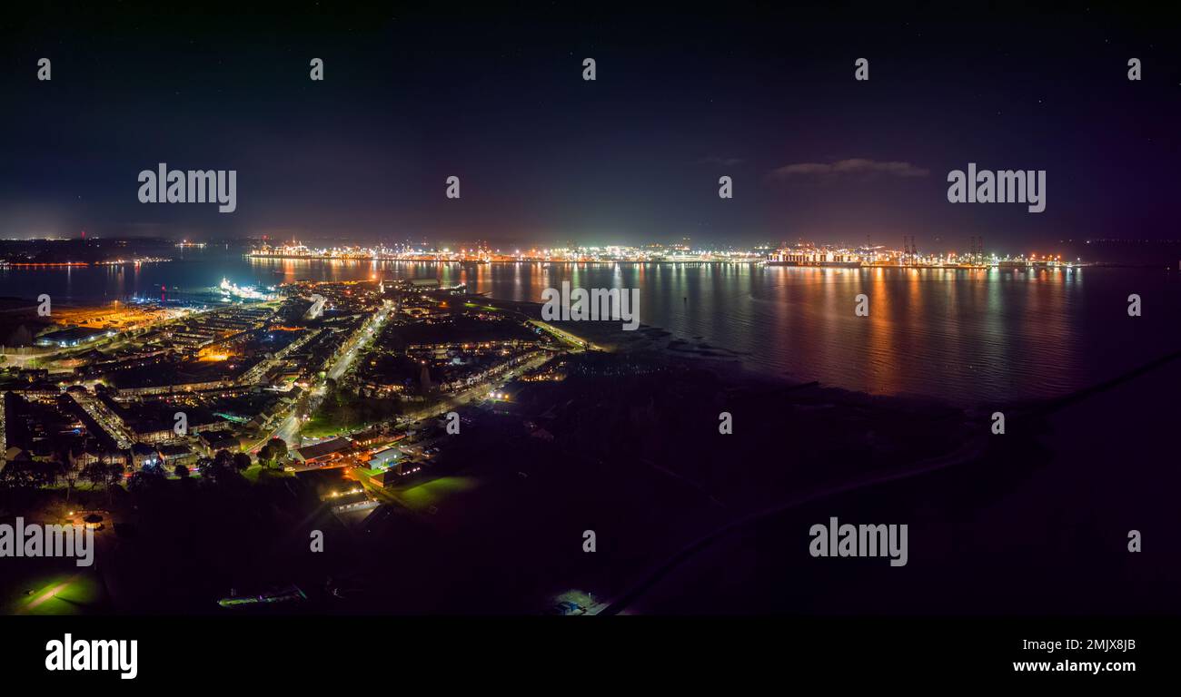 An aerial view of the ports of Harwich and Felixstowe at night in the UK Stock Photo