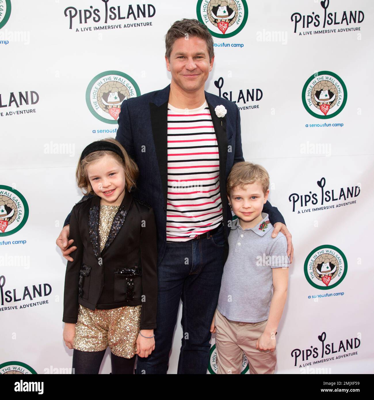 David Burtka, center, Harper Grace Burtka-Harris, left, and Gideon