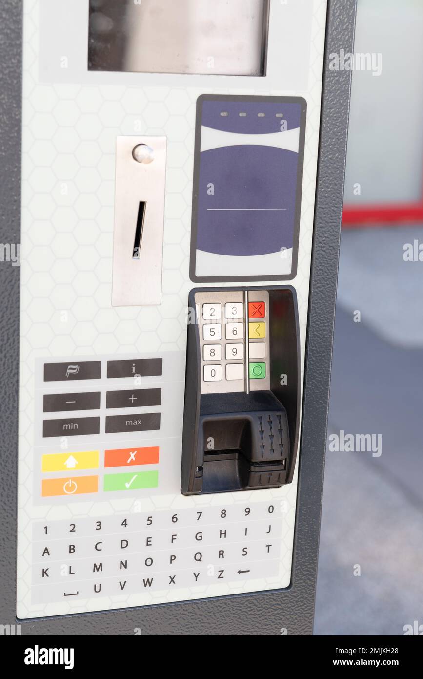 coin operated ticket machine pay station for roadside parking ticket in