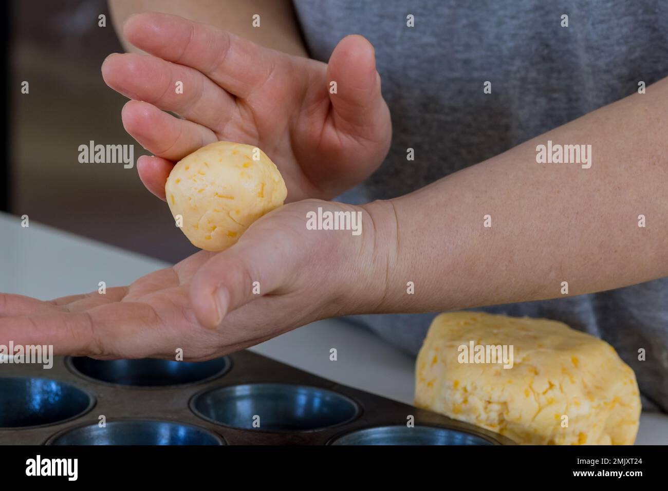 Brazilian cheese bun known as chipa, traditionally used as snack, is prepared by baking it from scratch Stock Photo