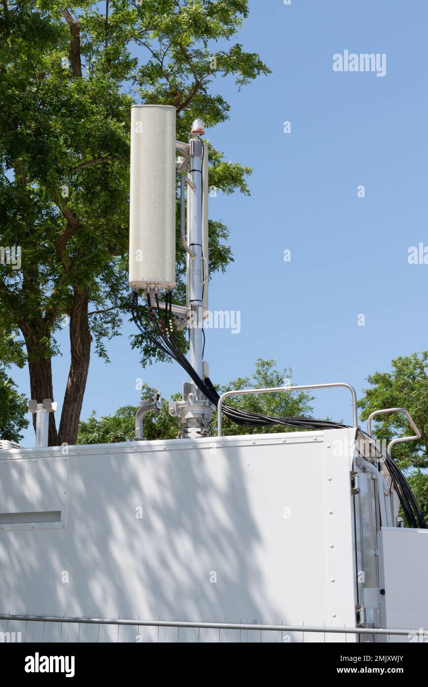 Communication Tower telephone relay antenna station cellular in city