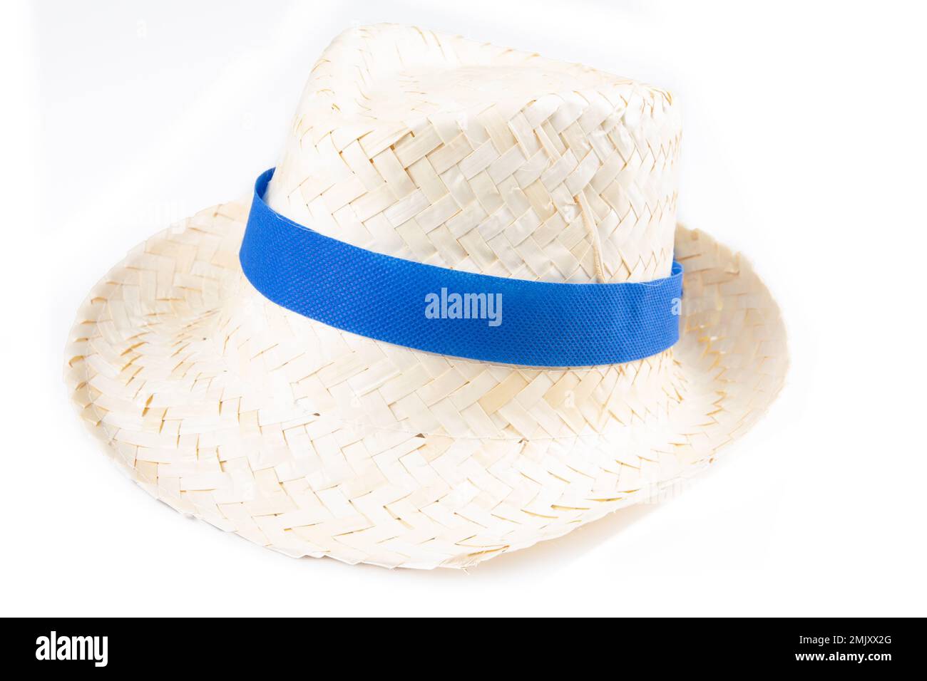 straw hat isolated blue ribbon band on white background Stock Photo