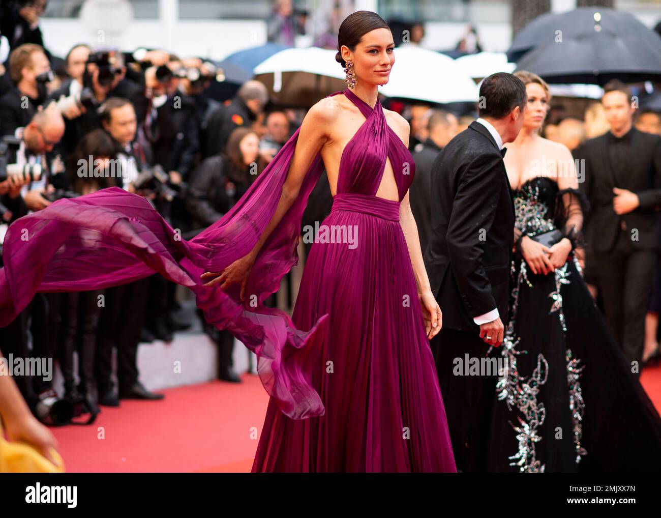 Actress Marica Pellegrinelli poses for photographers upon arrival at