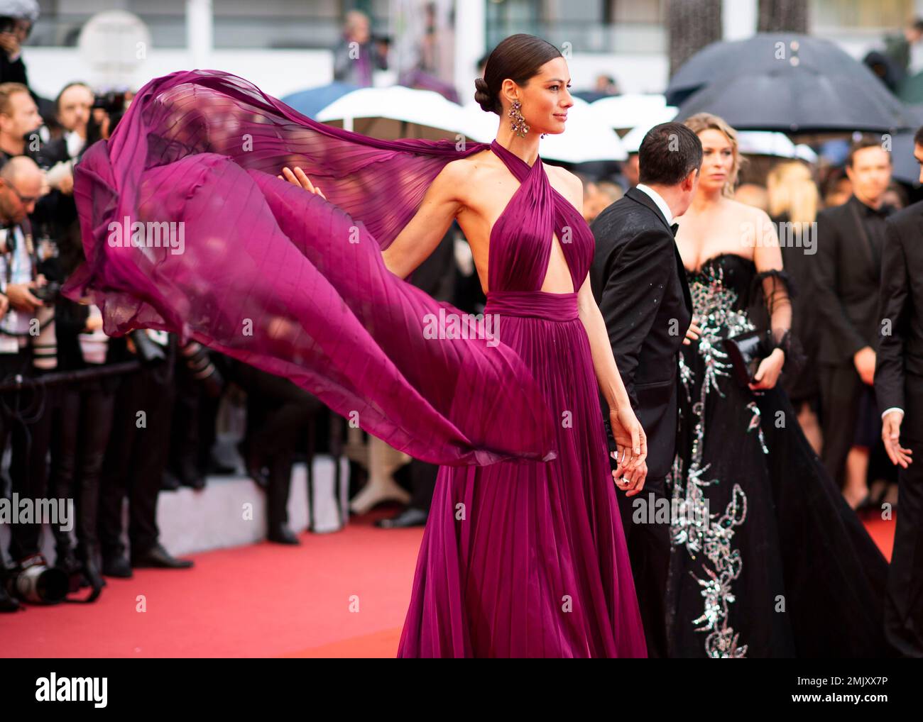 Actress Marica Pellegrinelli poses for photographers upon arrival at