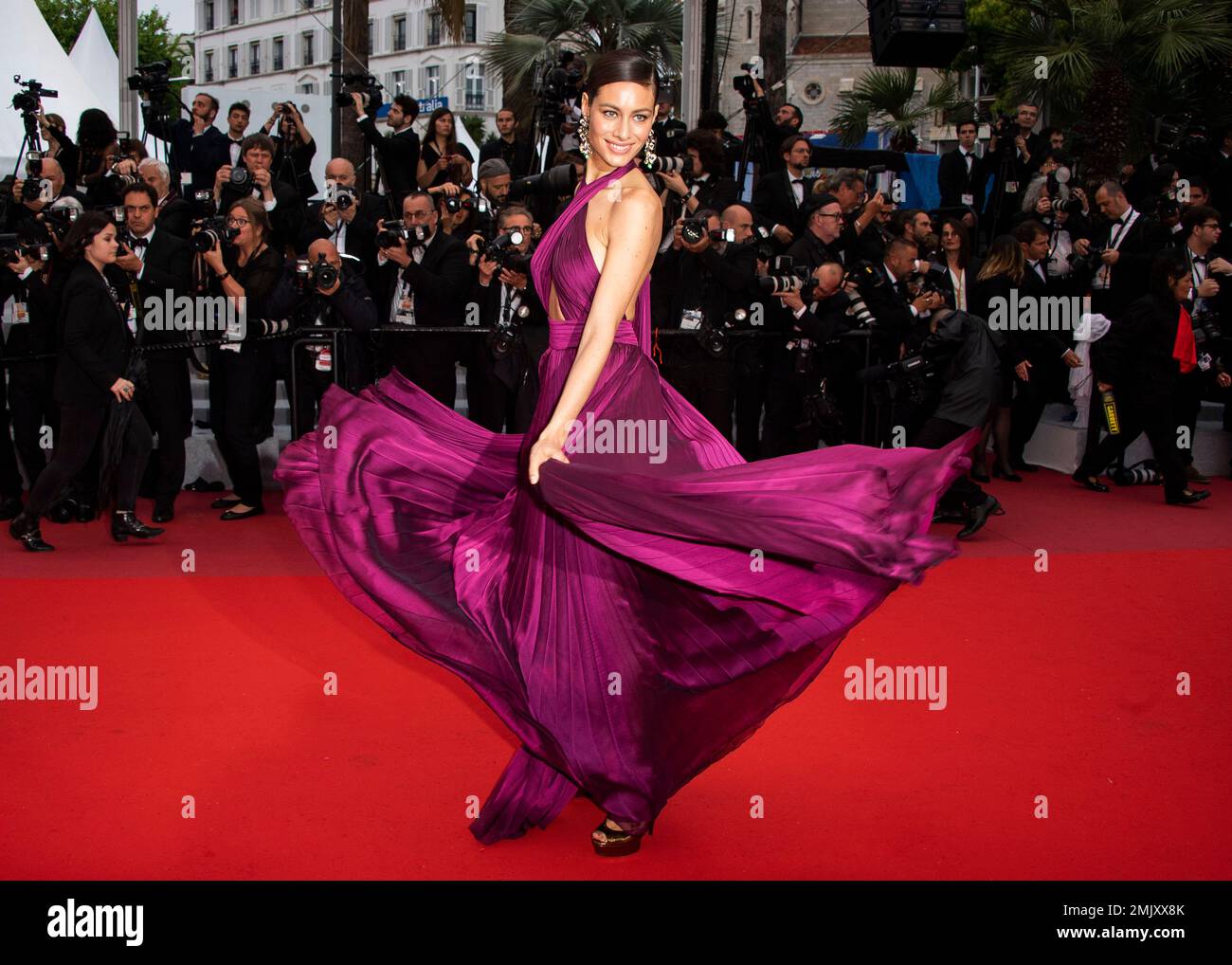 Actress Marica Pellegrinelli poses for photographers upon arrival at