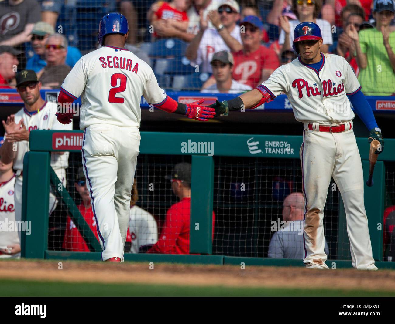 Philadelphia Phillies' Jean Segura is hit by a pitch during the fifth  inning in Game 2 of a National League wild-card baseball playoff series  against the St. Louis Cardinals, Saturday, Oct. 8