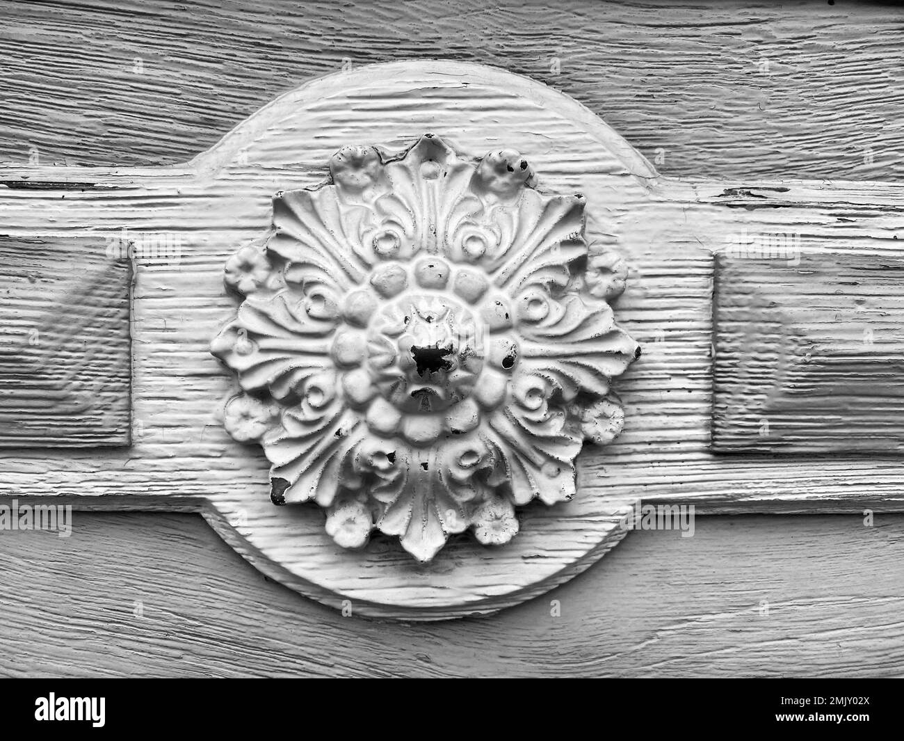 Detail of a white wooden door, used look Stock Photo