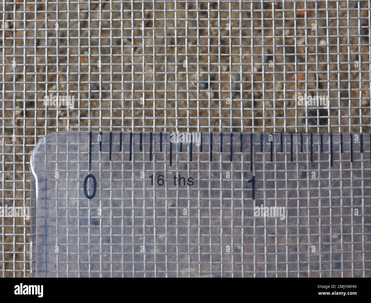 mosquito net mesh size measurement with imperial ruler Stock Photo Alamy