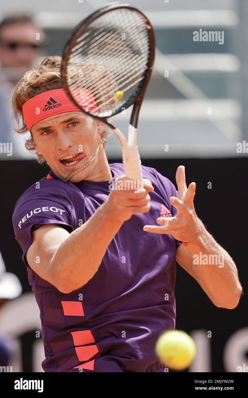 Alexander Zverev of Germany returns the ball to Matteo Berrettini of Italy at the Italian Open tennis tournament, in Rome, Tuesday, May, 14, 2019