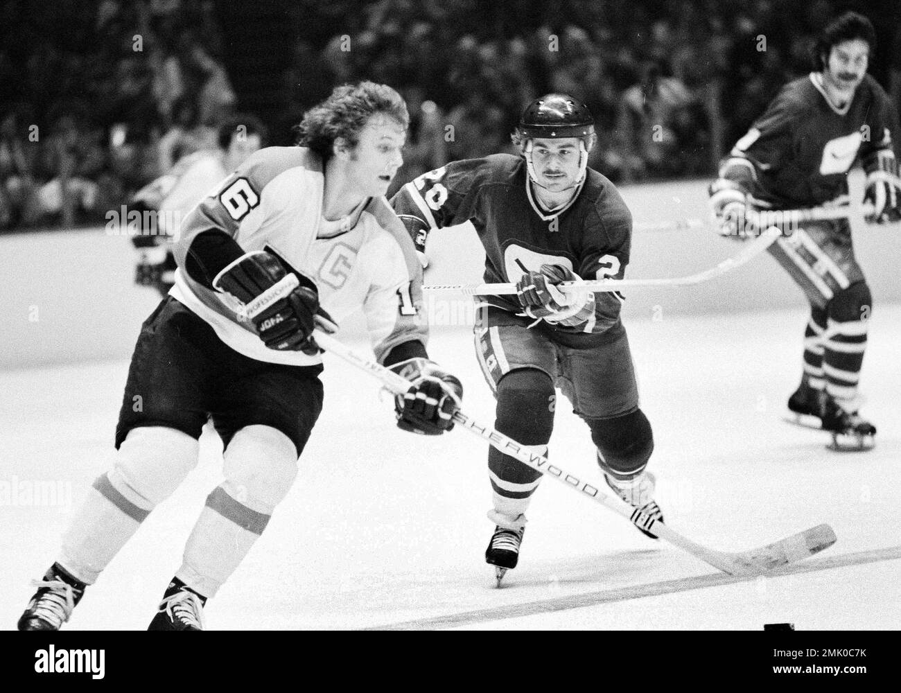 Bobby Clarke of the Philadelphia Flyers skates with the puck during