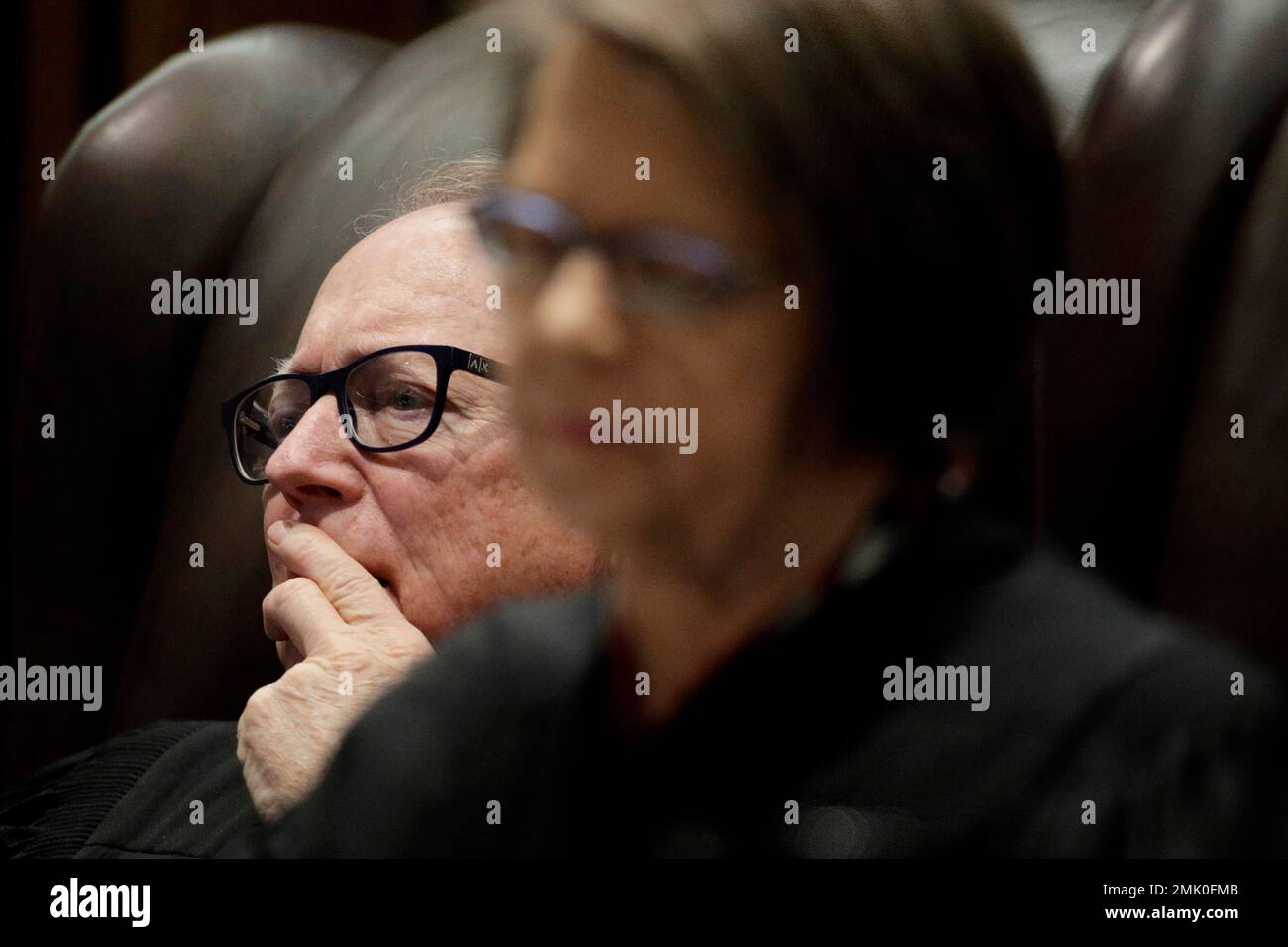 Kansas Supreme Court Senior Judge Michael Malone and Justice Marla