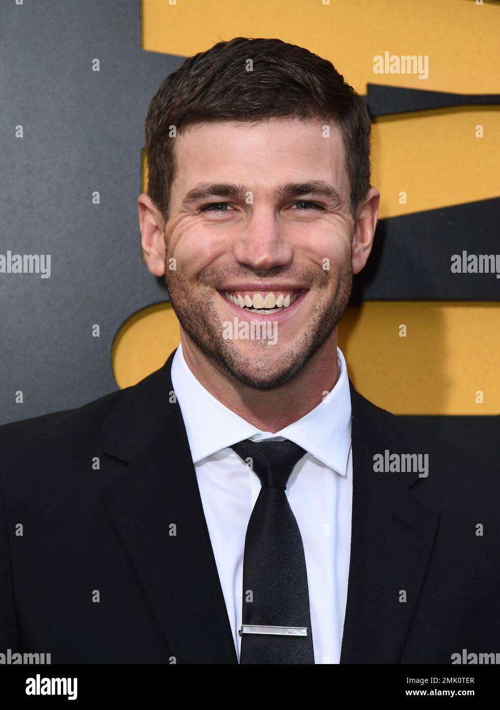 Austin Stowell arrives at the Los Angeles premiere of "Catch22" at TCL