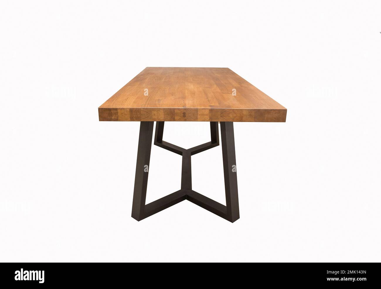 wooden lacquered table with black metal legs on white background Stock