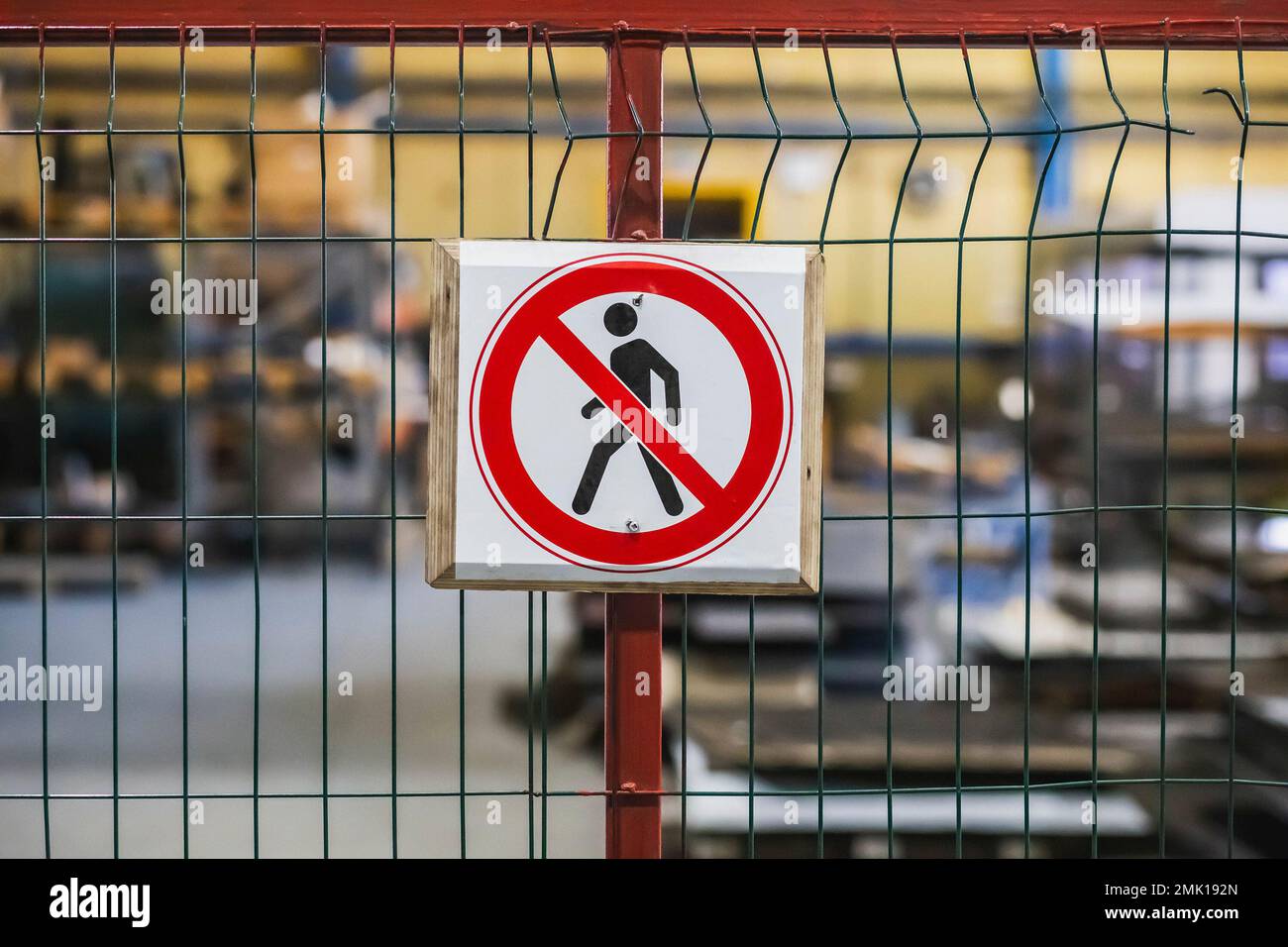 no-entry sign on the fence at the factory Stock Photo