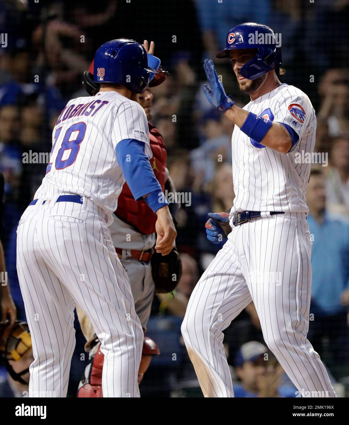 Chicago Cubs' Ben Zobrist celebrates with Kris Bryant after they