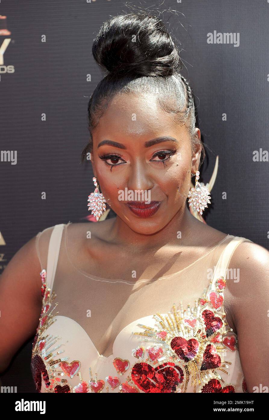 Ashly Williams arrives at the 46th annual Daytime Emmy Awards at the