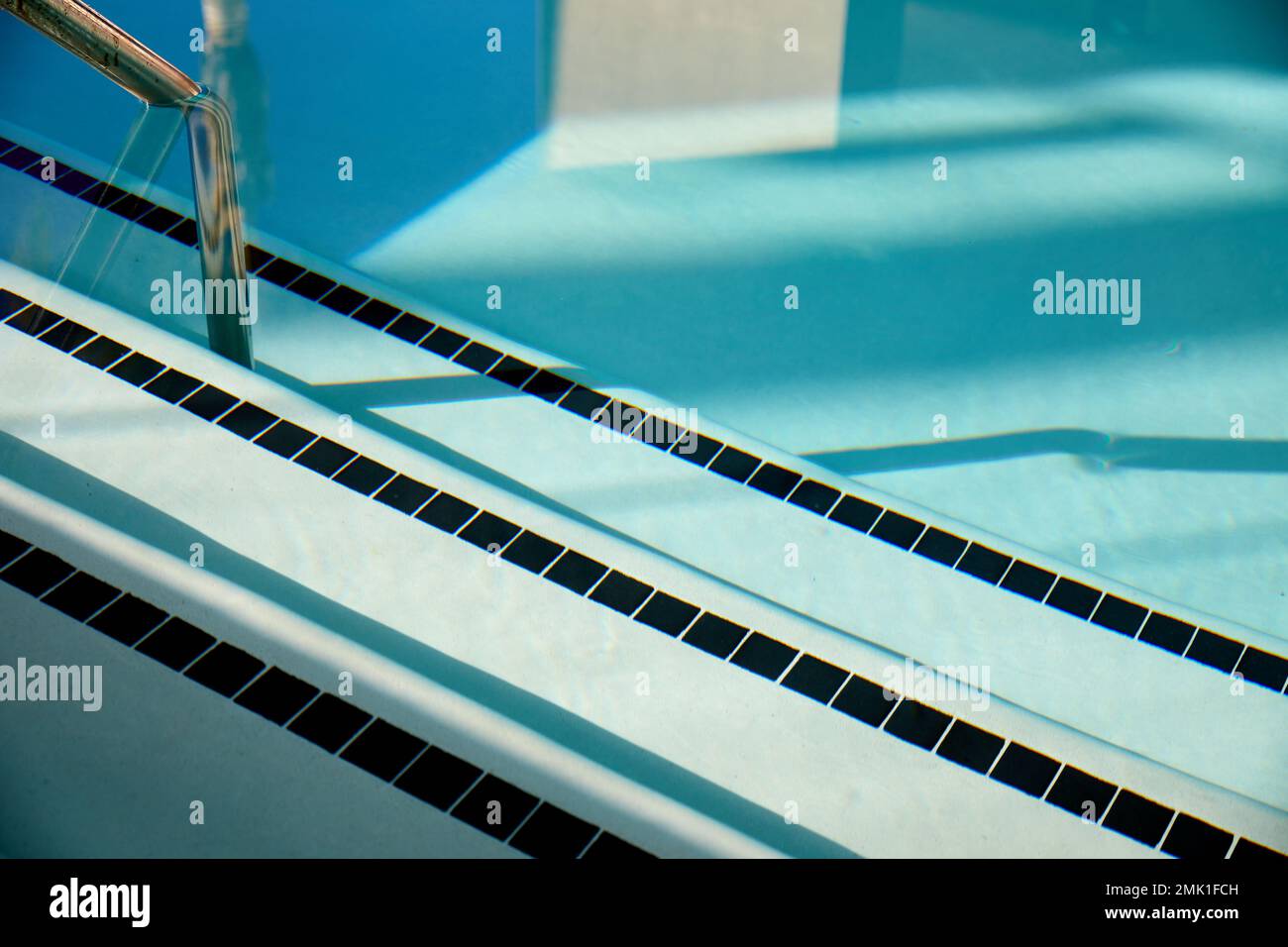 Swimming pool, handrail and stairs Stock Photo Alamy