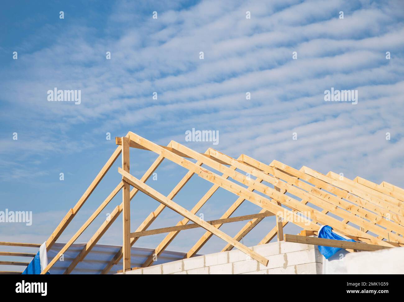 roof of an unfinished house under the blue sky Stock Photo - Alamy