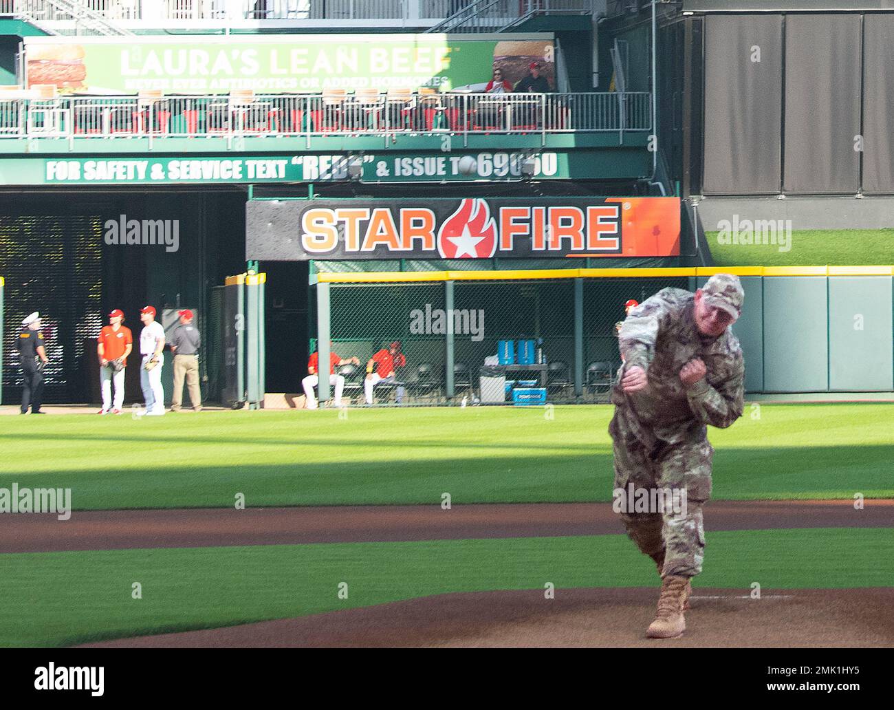 Col. Christopher Meeker, 88th Air Base Wing and Wright-Patterson Air Force Base commander, throws the ceremonial first pitch before the Reds vs. Rockies game Sept. 2, 2022, at Great American Ball Park in Cincinnati. Meeker was invited to throw out the pitch as part of the Reds’ annual Military Appreciation Night. Stock Photo
