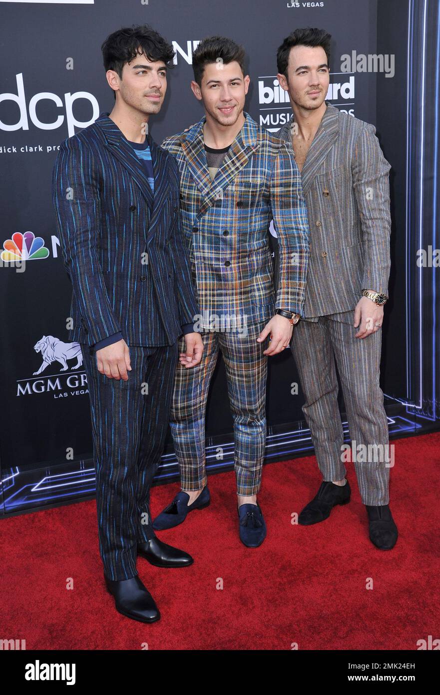 Joe Jonas, from left, Nick Jonas, and Kevin Jonas arrive at the Billboard  Music Awards on Wednesday, May 1, 2019, at the MGM Grand Garden Arena in  Las Vegas. (Photo by Richard