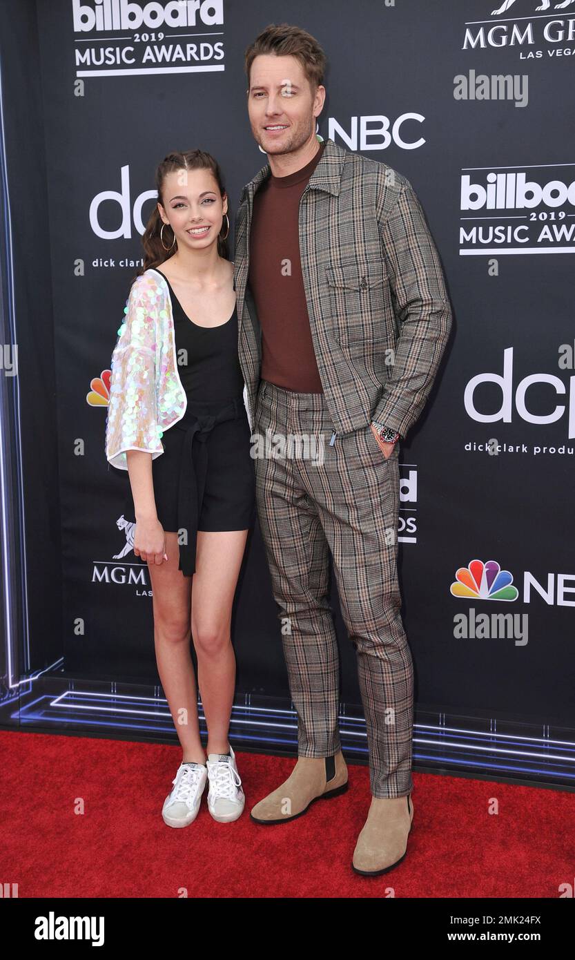 Isabella Justice Hartley, left, and Justin Hartley arrive at the