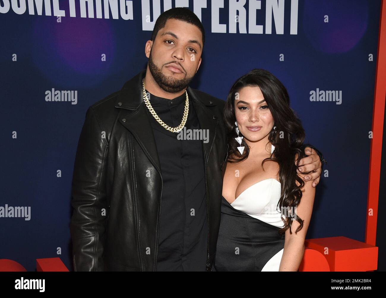 Actor O'Shea Jackson Jr., left, and girlfriend Danielle Nieto attend