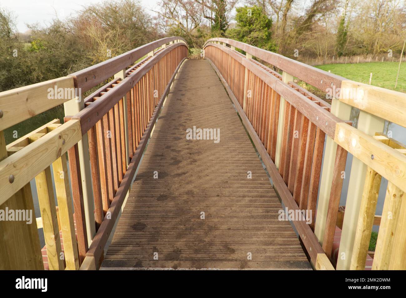 Looking along the length of the new Fen Bridge which stretches over the River Stour in the Dedham Vale on the Essex and Suffolk border. Stock Photo