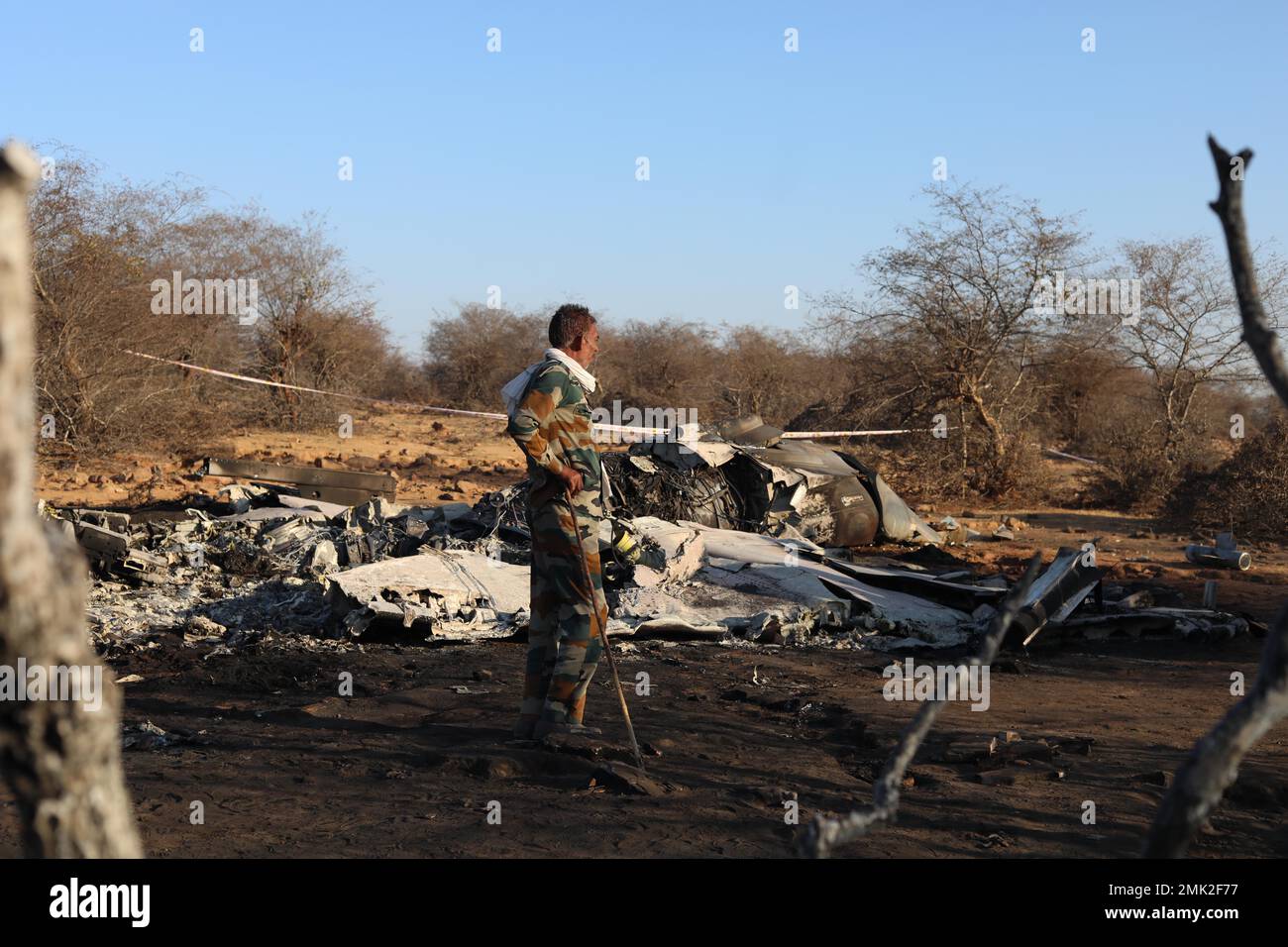 Jabalpur, India. 28th Jan, 2023. Gwalior, Madhya Pradesh, India, January, 28,2023. People stand near the wreckage of an aircraft after a Sukhoi Su-30 and Dassault Mirage 2000 fighter jet crashed during an exercise in Pahargarh area, about 50 kilometers (30 miles) from Gwalior, Madhya Pradesh on January 28, 2023. Police present at the accident site said that there was an apparent mid-air collision during the exercise on 28 January. Photo By - Uma Shankar Mishra Credit: River Ganga/Alamy Live News Stock Photo