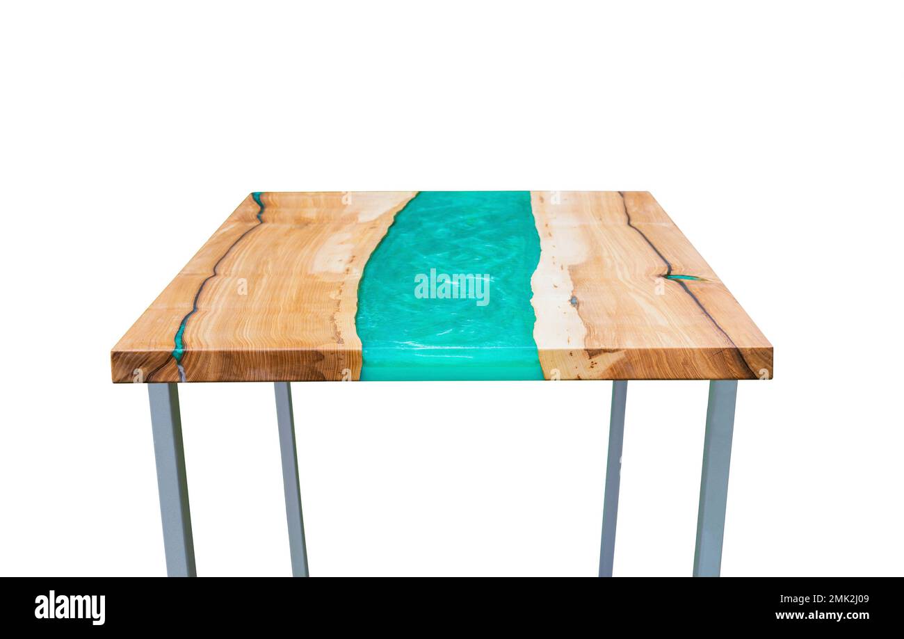 Modern epoxy dining table on white background. Side view. Interior  Stock Photo