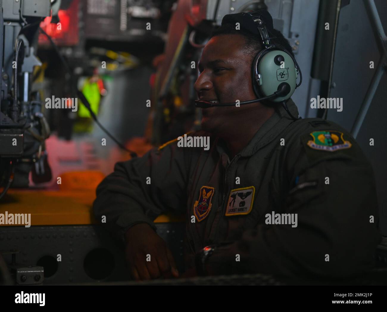 Capt. Zaquero Hartnett, a 69th Bomb Squadron electronic warfare officer, talks to aircrew during a flyover at A.W. Mumford Stadium, Baton Rouge, La., Sept. 3, 2022. The Flyover was held to promote recruitment and highlight Air Force Global Strike’s Project Tuskegee. Stock Photo