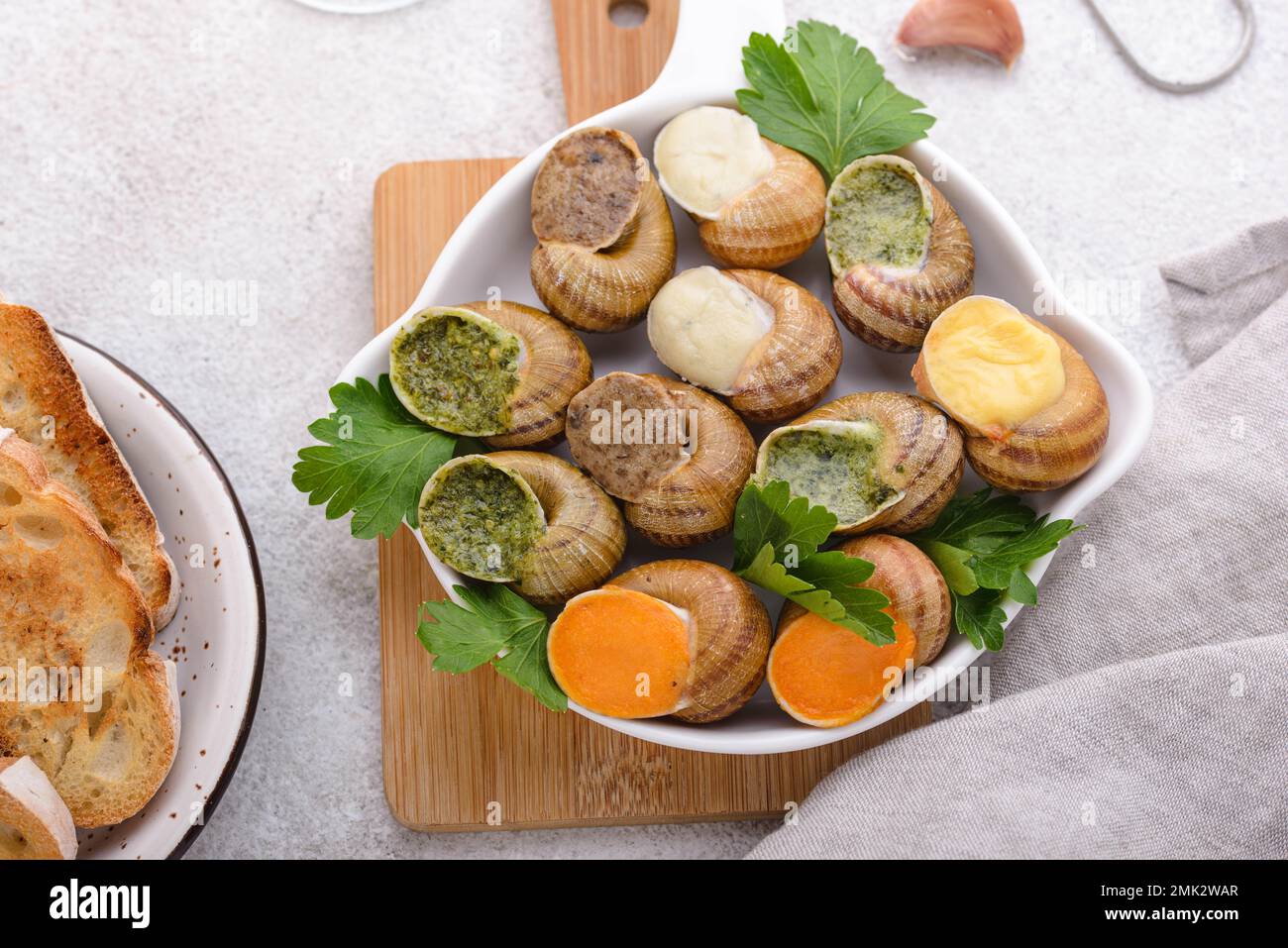 Baked snails Escargot with bread Stock Photo Alamy