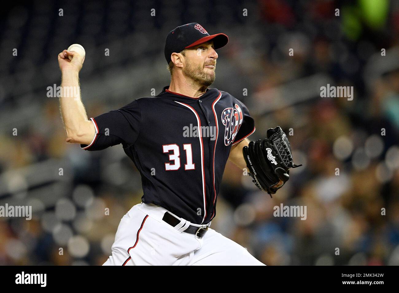 Washington Nationals starting pitcher Max Scherzer delivers a