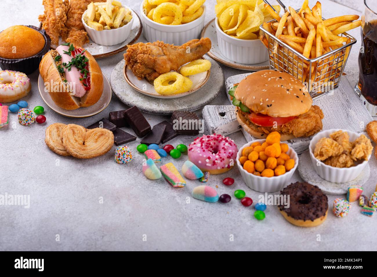 Assortment of various unhealthy junk food Stock Photo - Alamy