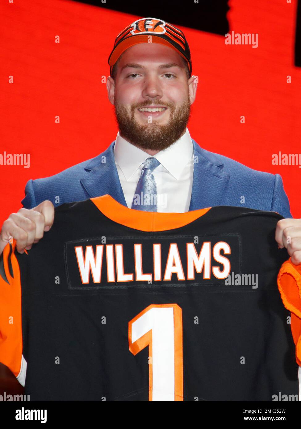 Alabama tackle Jonah Williams poses with his new team jersey after the  Cincinnati Bengals selected Williams in the first round at the NFL football  draft, Thursday, April 25, 2019, in Nashville, Tenn. (