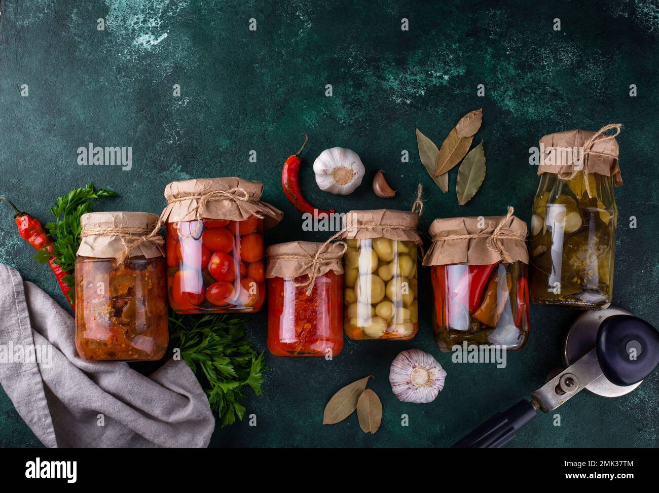 Pickled vegetables in glass jars. Stock Photo