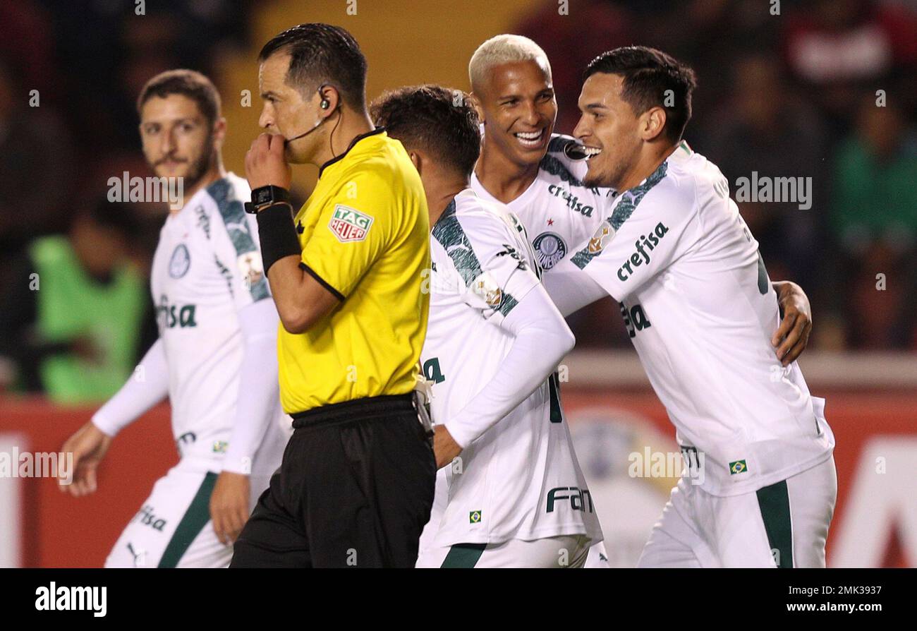 Gustavo Gomez of Brazil's Palmeiras heads the ball challenged by Carlos  Carmona of Chile's Colo Colo, right, during a quarter final second leg Copa Libertadores  soccer match in Sao Paulo, Brazil, Wednesday