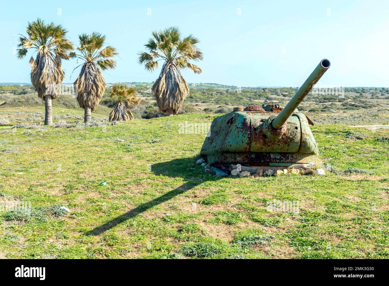 The turret of an old Soviet T34/85 tank rusts away on the beach of Agia Eirini/Akdeniz North Cyprus. Stock Photo