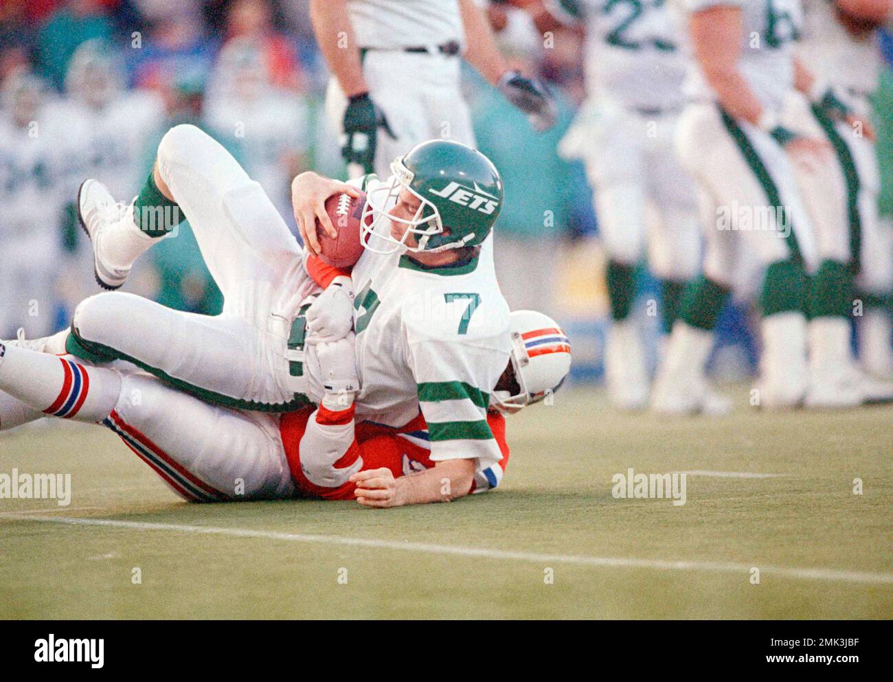 New York Jets' quarterback Ken O'Brien gets a taste of the turf at